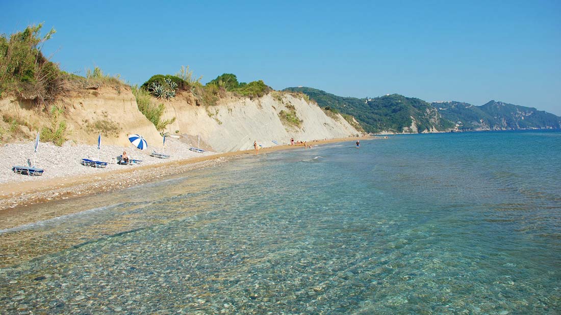 arillas-beach-corfu-north-corfu-ionian-islands-ionian-sea-pebbles-sand-sea-sun-blue-waters-family-friends-holidays-vacation-summer-tourism-village-restaurants-taverns-bars-hotels