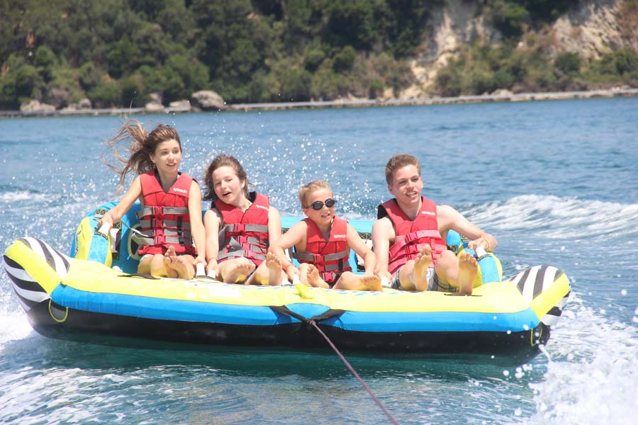 dassia-ski-club-watersports-corfu-inflatables-fun-dassia-sea-summer-beach-coast-adrenaline-yacht-towing-waves-sports-friends-family-summer-in-corfu-holidays-vacation-freetime-funtime-activities-sofa