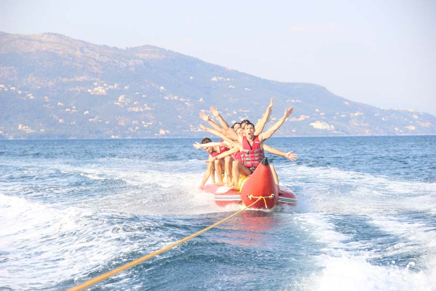 dassia-ski-club-watersports-corfu-inflatables-fun-dassia-sea-summer-beach-coast-adrenaline-yacht-towing-waves-sports-friends-family-summer-in-corfu-holidays-vacation-freetime-funtime-activities-banana