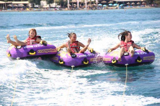 dassia-ski-club-watersports-rings-corfu-inflatables-fun-dassia-sea-summer-beach-coast-adrenaline-yacht-towing-waves-sports-friends-family-summer-in-corfu-holidays-vacation-freetime-funtime-activities-ringos