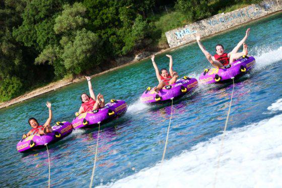 dassia-ski-club-watersports-rings-corfu-inflatables-fun-dassia-sea-summer-beach-coast-adrenaline-yacht-towing-waves-sports-friends-family-summer-in-corfu-holidays-vacation-freetime-funtime-activities-ringos