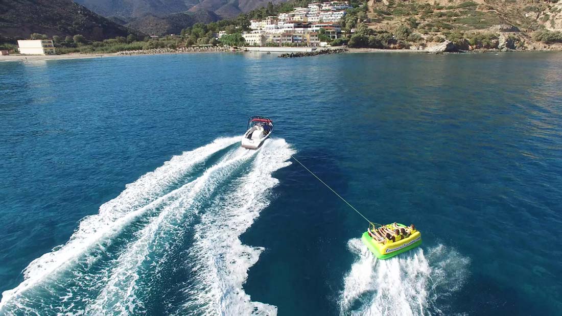 Towing-Boat-Yacht-Waves-Sea-Corfu-Beach-Coast-Sun-Summer-Watersports-Sports-Landscape-Adrenaline-Dassia-dassia-ski-club-family-friends-vacation-holidays-excursion-water-inflatables